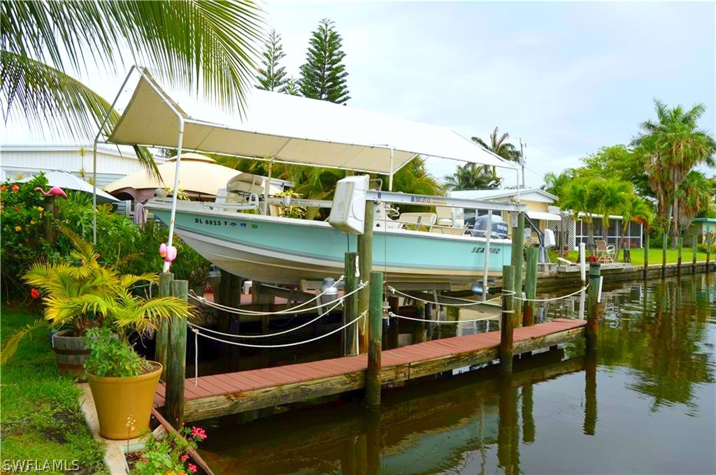 2591 Cay Cove Matlacha, FL 33993 - Photo 5 of 20 a view of outdoor space swimming pool and lake view