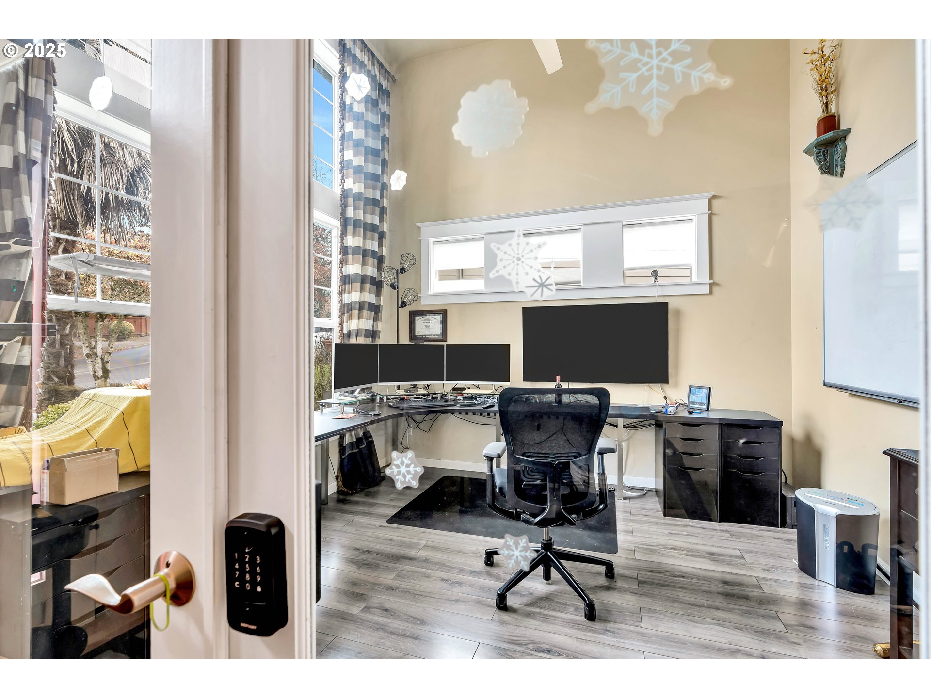 13755 Southwest Sandridge Drive Portland, OR 97223 - Photo 2 of 36 a view of a workspace with furniture and a fireplace