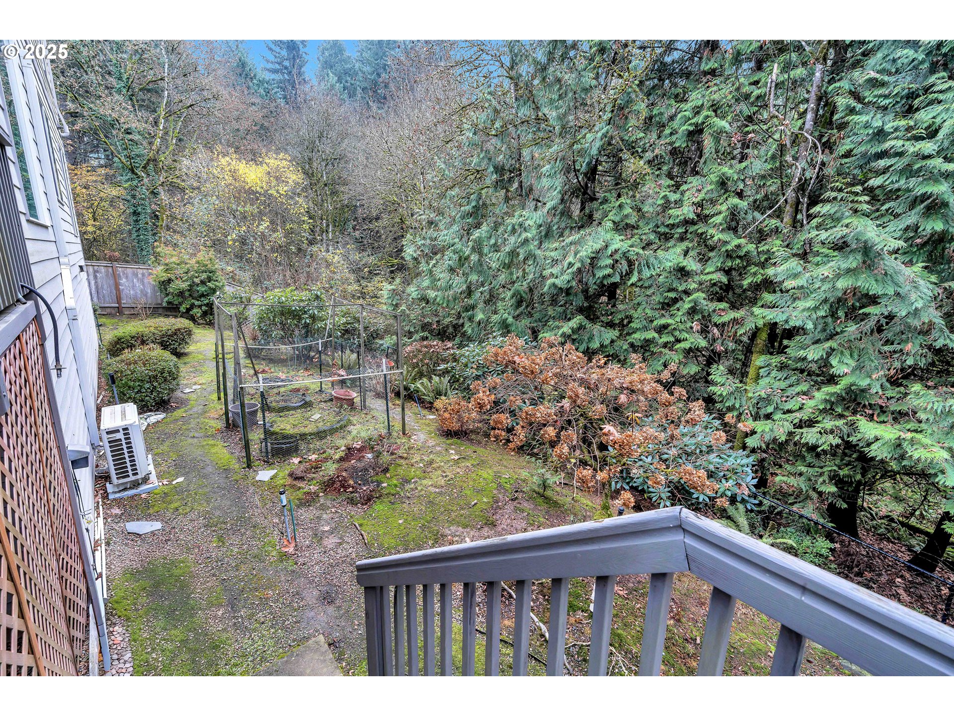 13755 Southwest Sandridge Drive Portland, OR 97223 - Photo 32 of 36 a view of a forest from a balcony