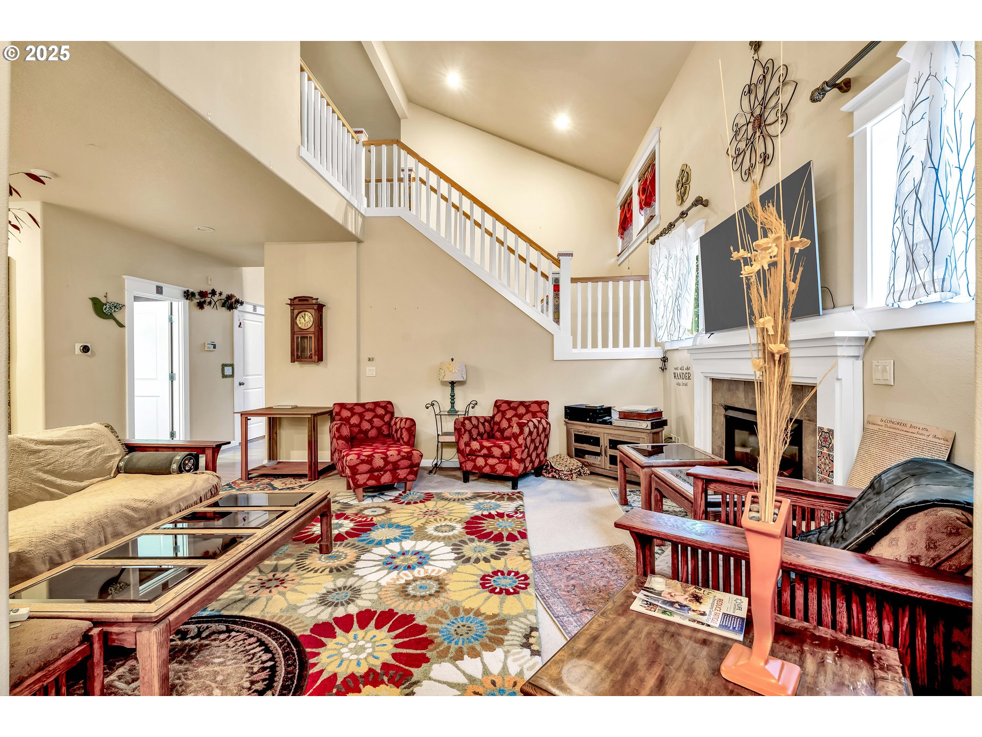 13755 Southwest Sandridge Drive Portland, OR 97223 - Photo 4 of 36 a living room with patio furniture and a rug