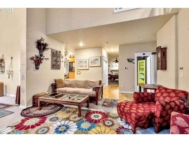 a living room with furniture and a rug