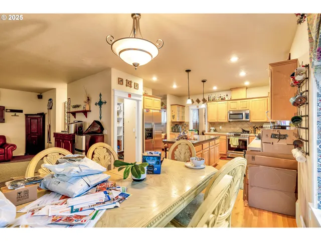 a view of a living room and dining room