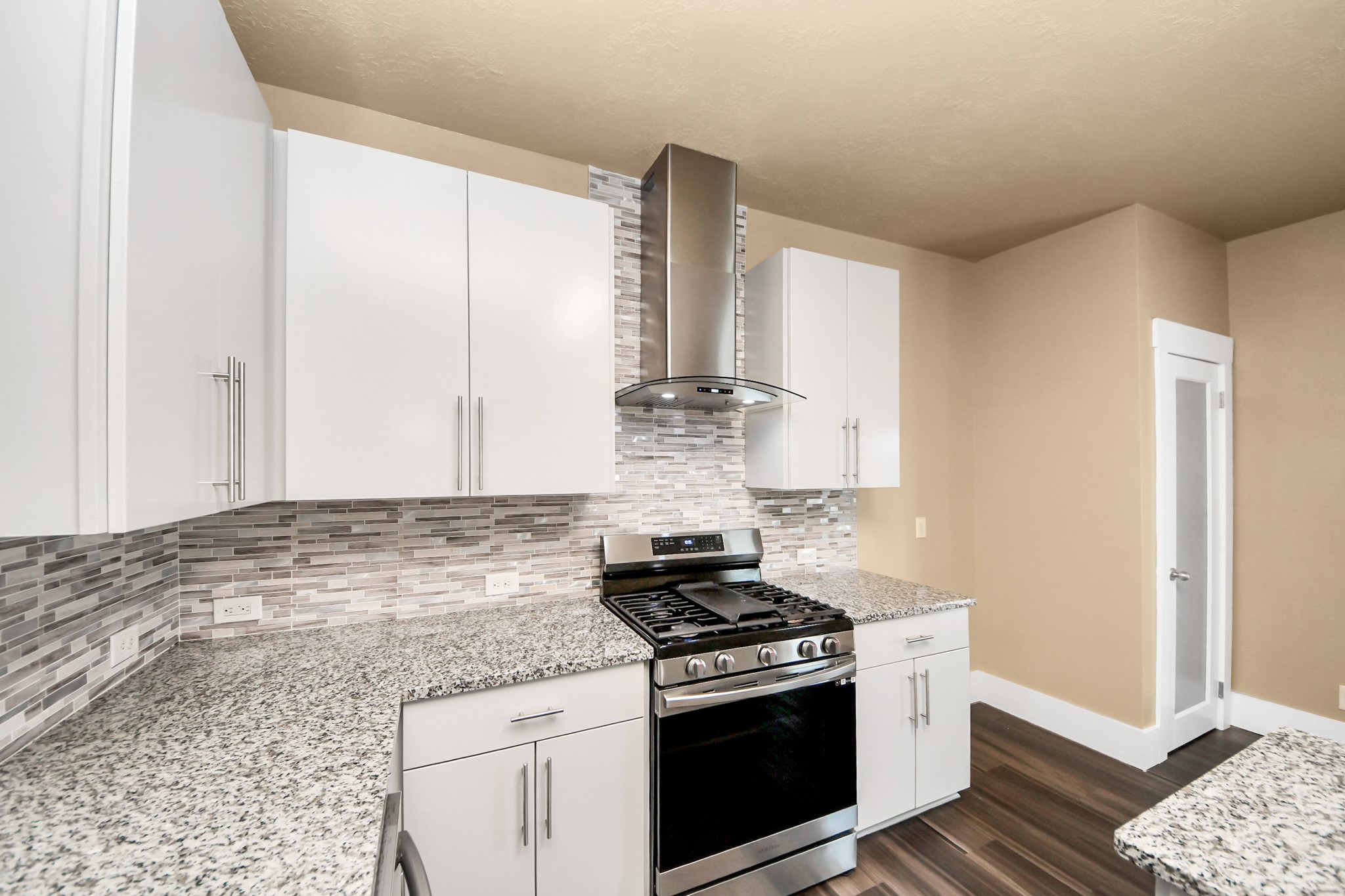 1 Desert Spring Lane Manvel, TX 77578 - Photo 15 of 45 a kitchen with stainless steel appliances granite countertop a stove and a granite counter tops