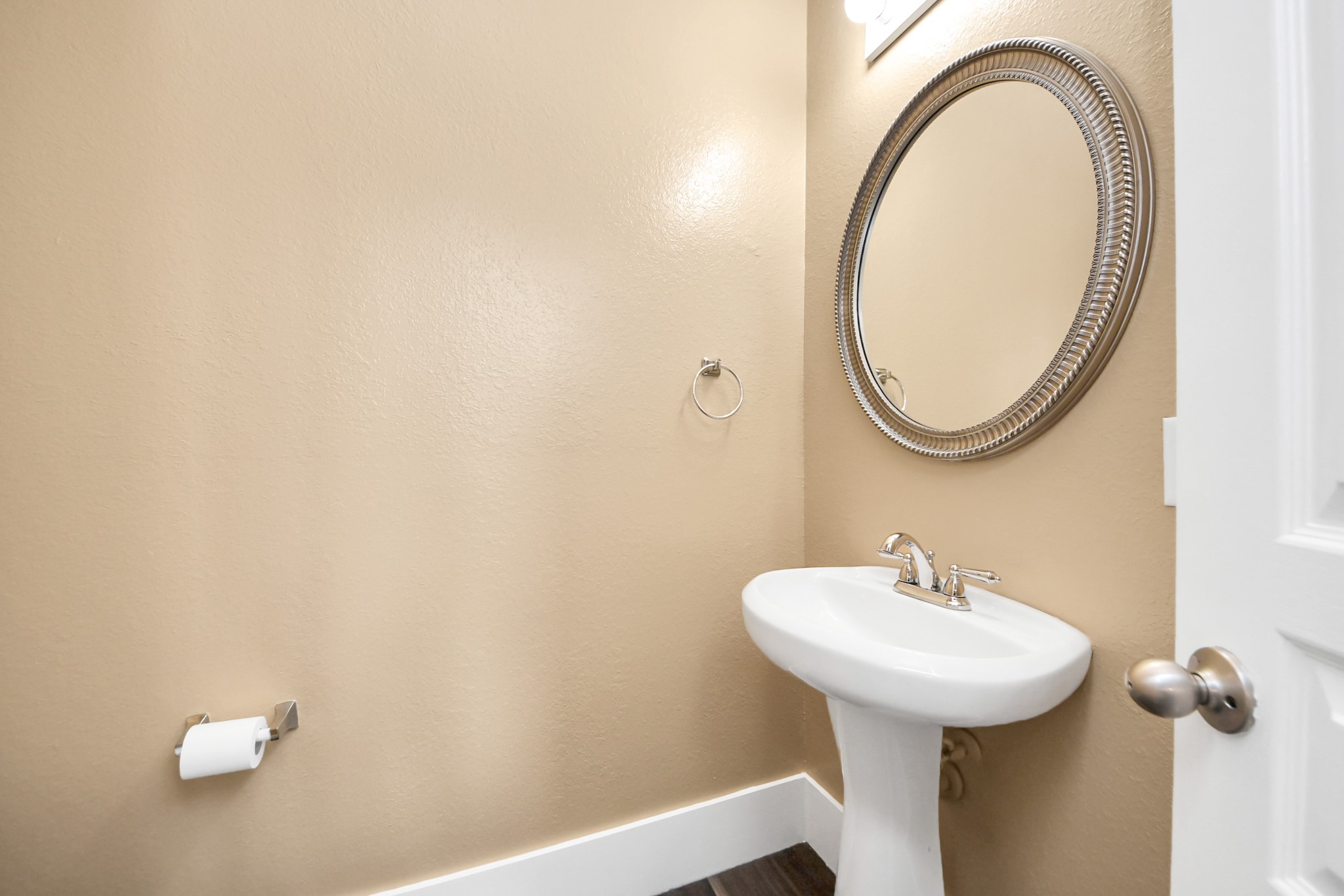 1 Desert Spring Lane Manvel, TX 77578 - Photo 20 of 45 a bathroom with a sink and a mirror