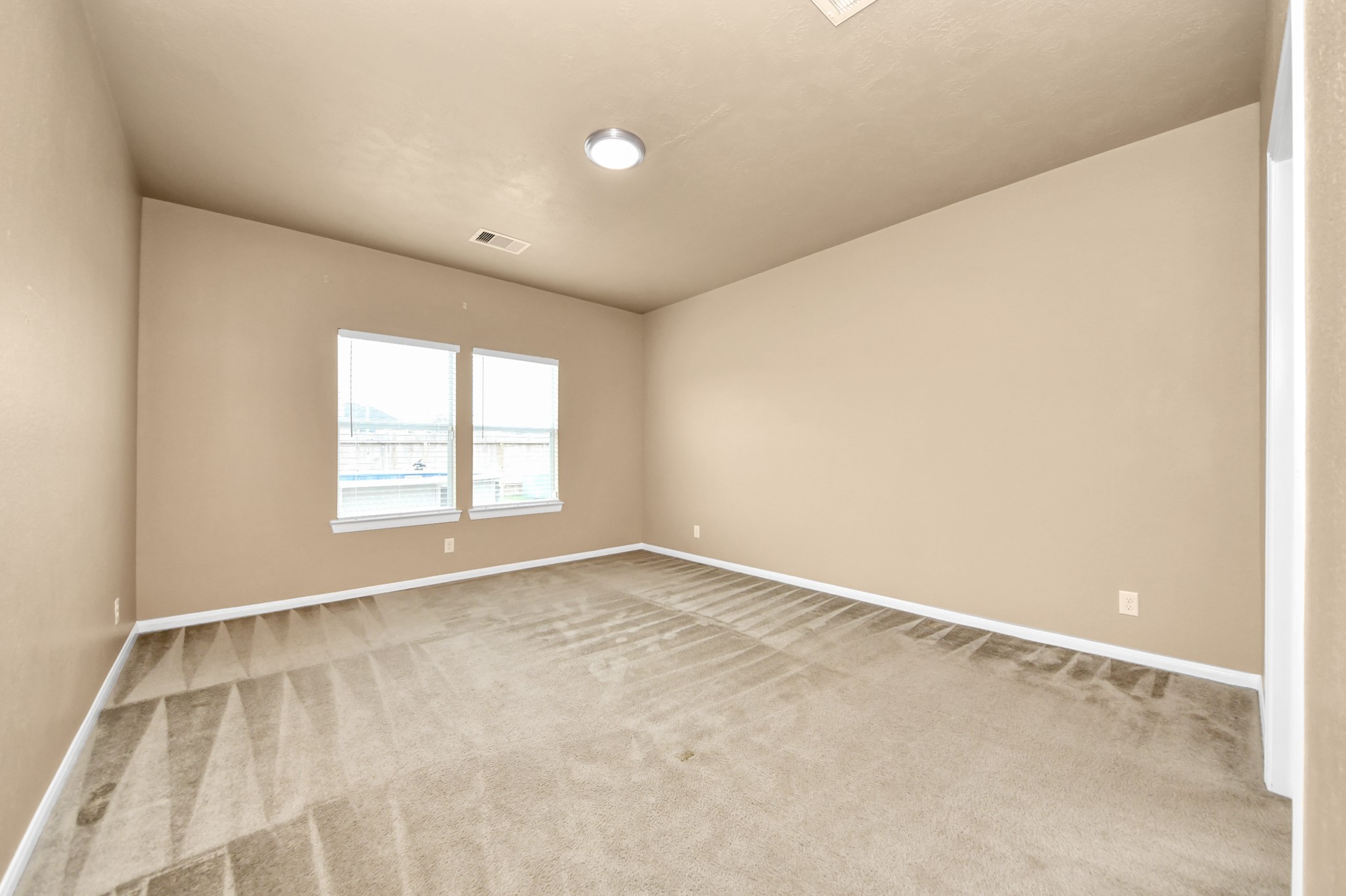 1 Desert Spring Lane Manvel, TX 77578 - Photo 22 of 45 an empty room with windows