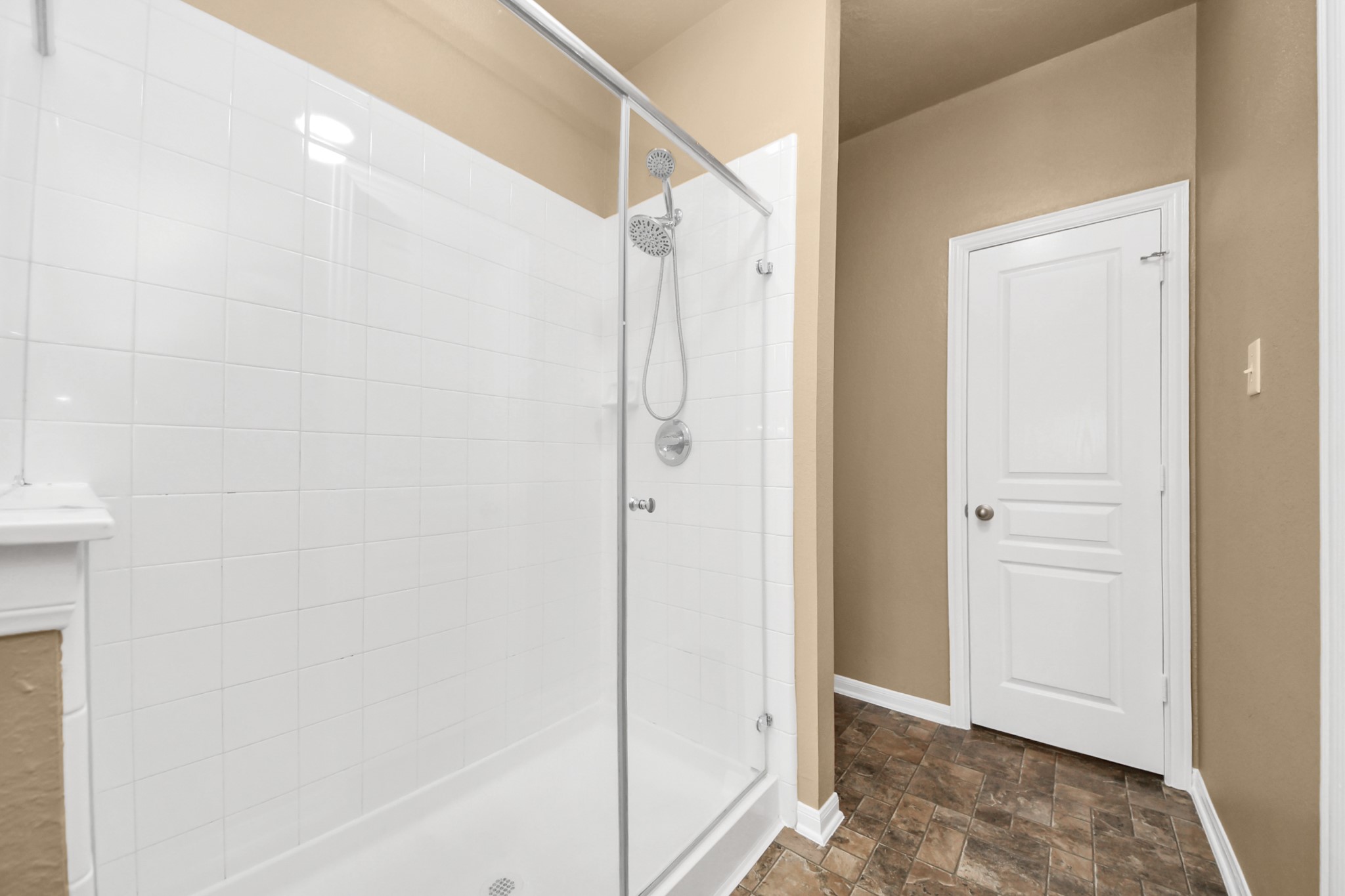 1 Desert Spring Lane Manvel, TX 77578 - Photo 25 of 45 a bathroom with a shower and a glass door