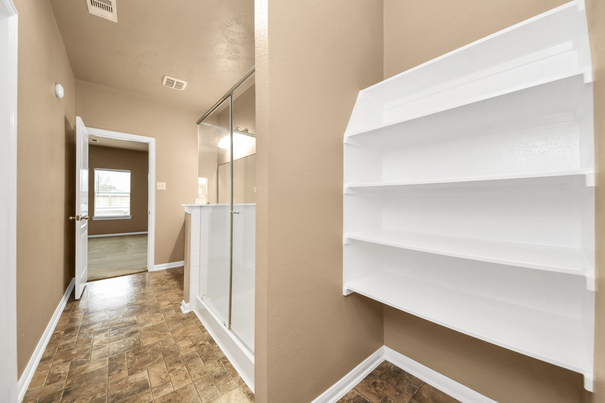 1 Desert Spring Lane Manvel, TX 77578 - Photo 26 of 45 a view of hallway with bathroom