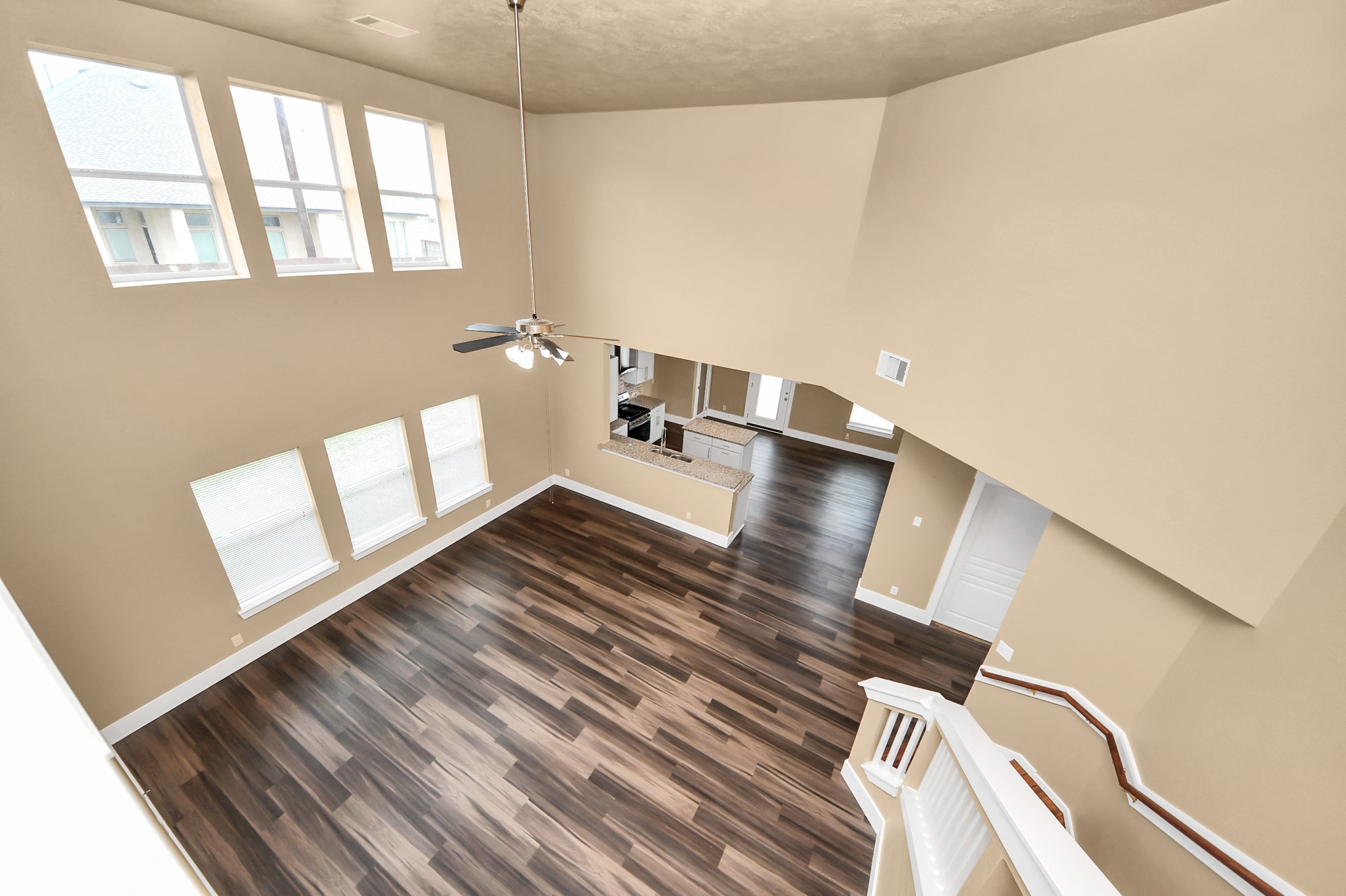 1 Desert Spring Lane Manvel, TX 77578 - Photo 31 of 45 a view of wooden floor and windows in a room