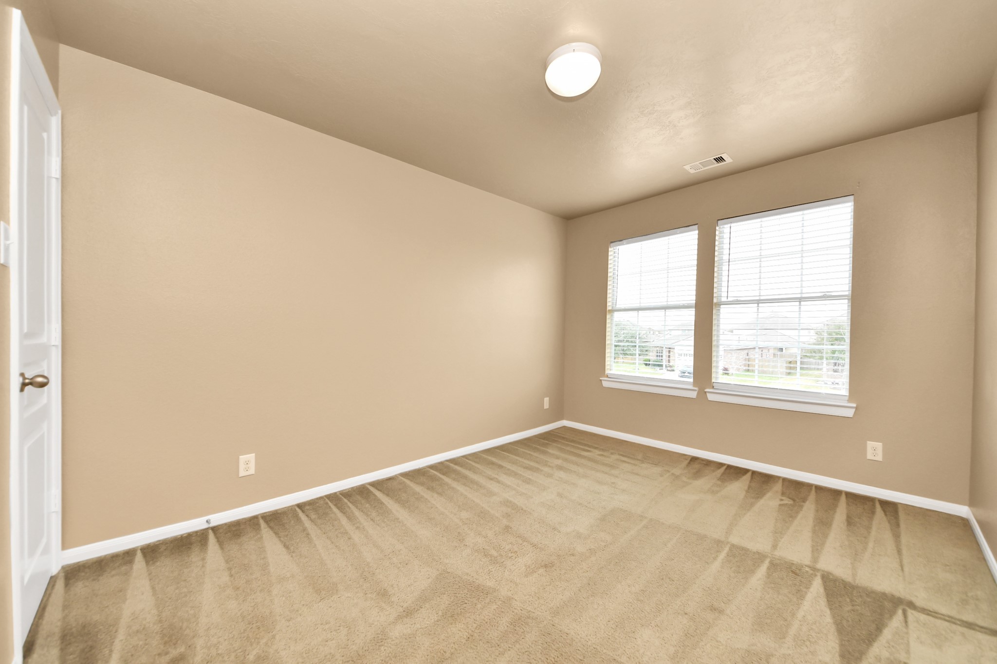1 Desert Spring Lane Manvel, TX 77578 - Photo 34 of 45 an empty room with a window
