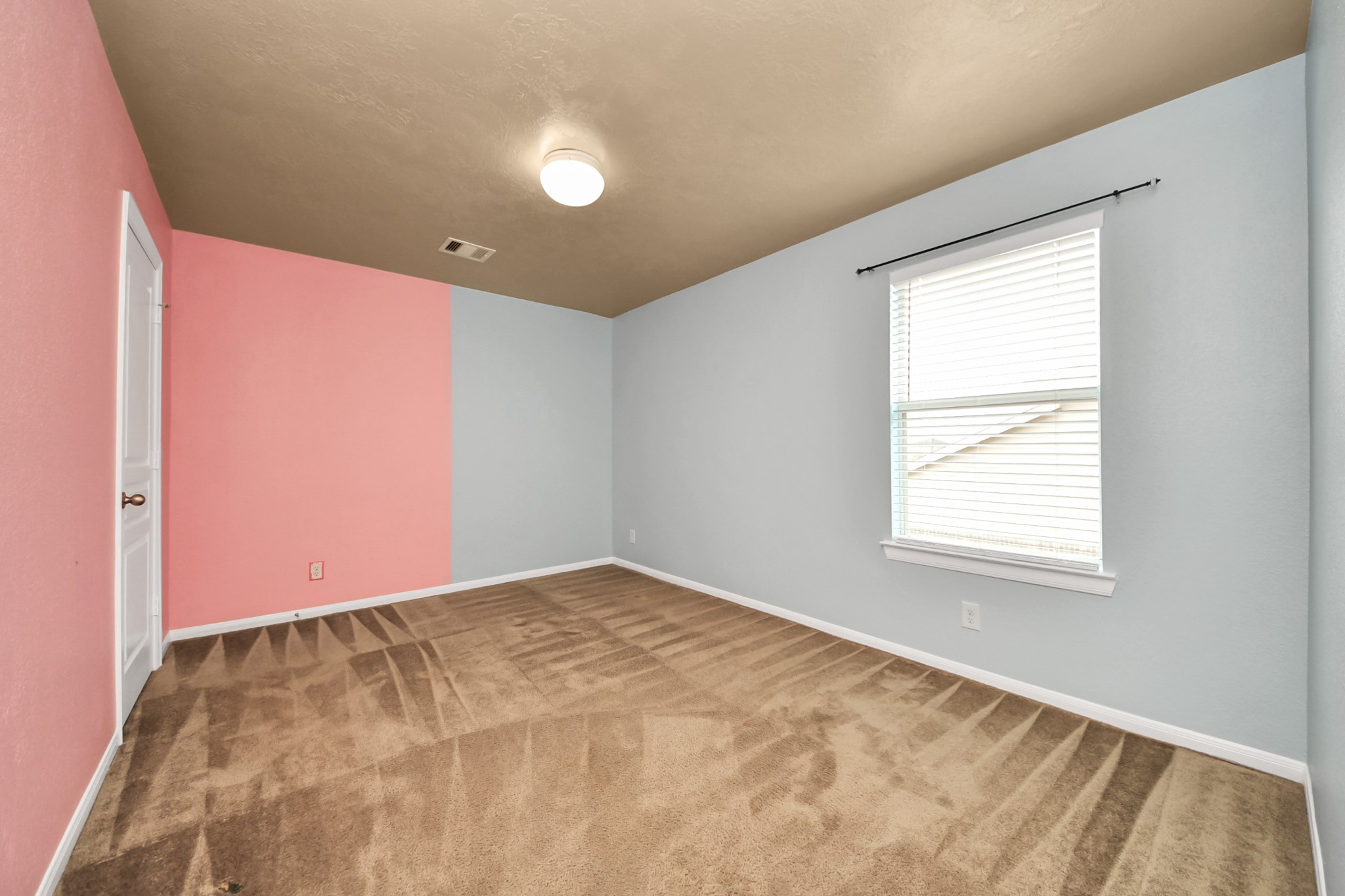 1 Desert Spring Lane Manvel, TX 77578 - Photo 37 of 45 an empty room with a window