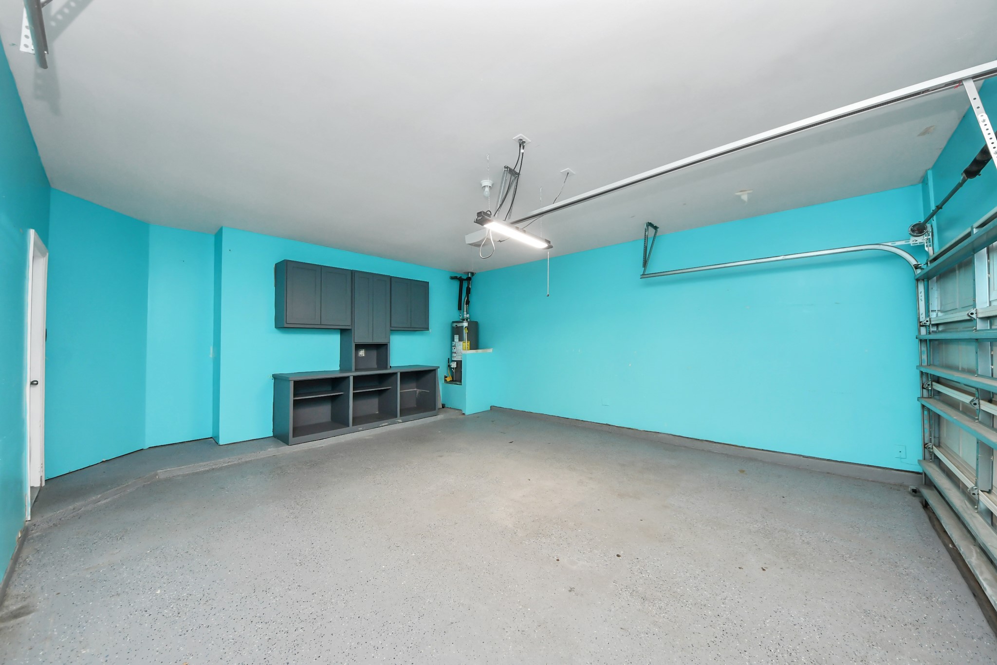 1 Desert Spring Lane Manvel, TX 77578 - Photo 38 of 45 a view of an empty room with cabinet and a window