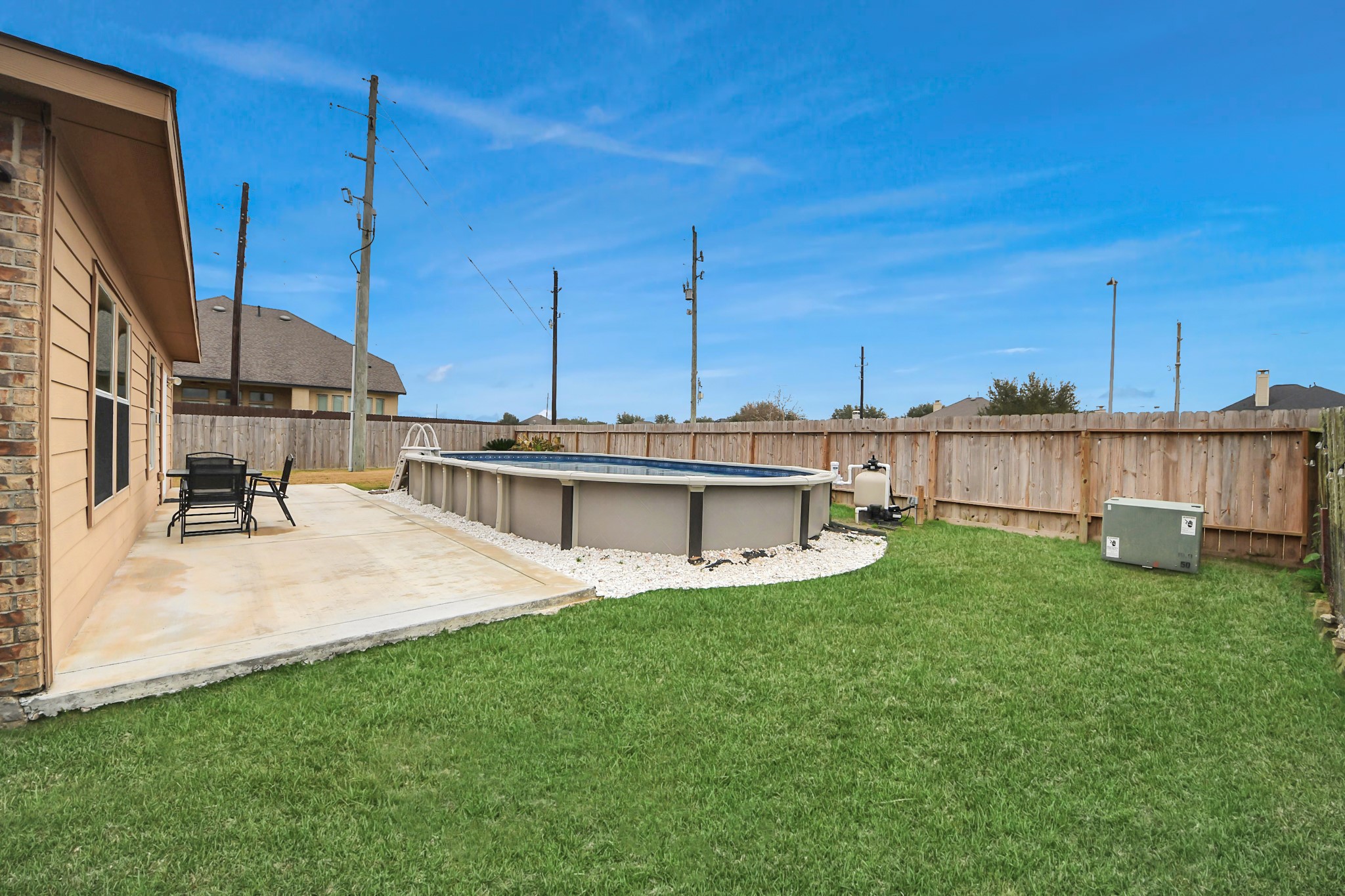 1 Desert Spring Lane Manvel, TX 77578 - Photo 41 of 45 a view of a house with backyard and sitting area