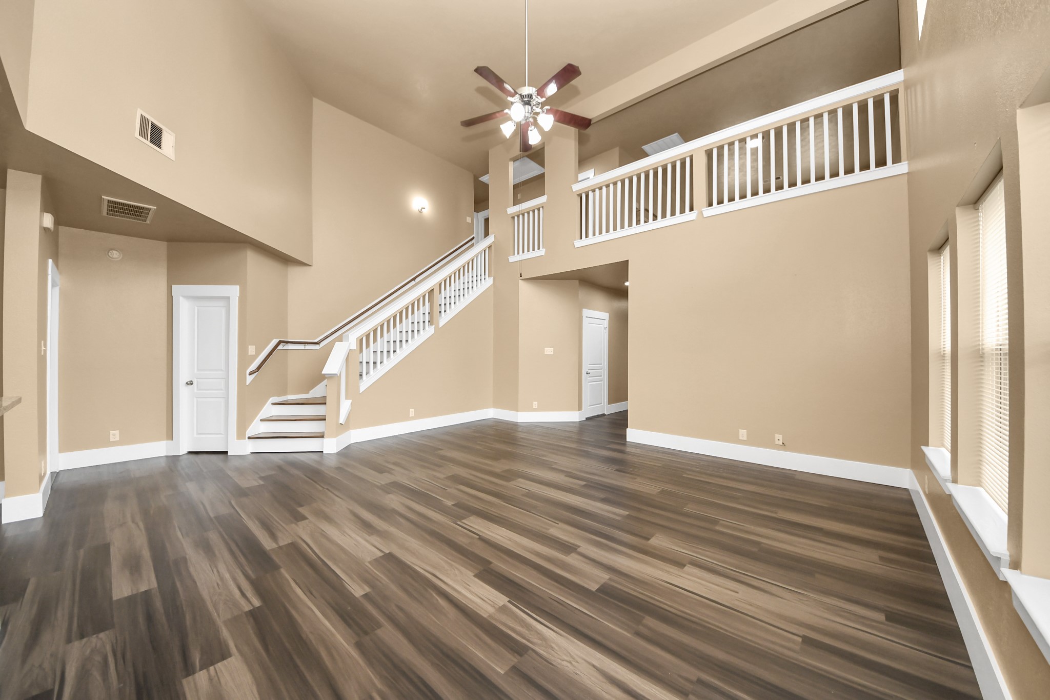1 Desert Spring Lane Manvel, TX 77578 - Photo 9 of 45 a view of an entryway with wooden floor