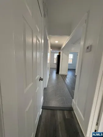 a bathroom with a toilet a sink and bathtub