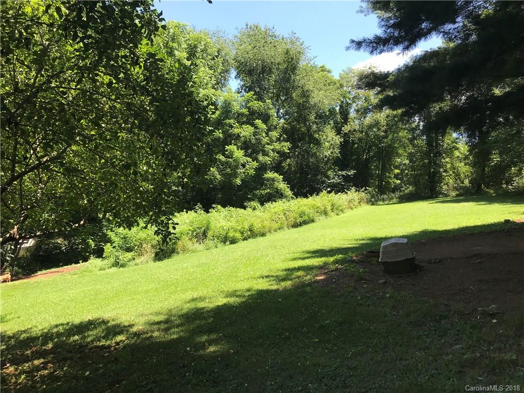 14 Rivers Edge Way, Unit 14 Canton, NC 28716 - Photo 7 of 12 a view of a field with of trees