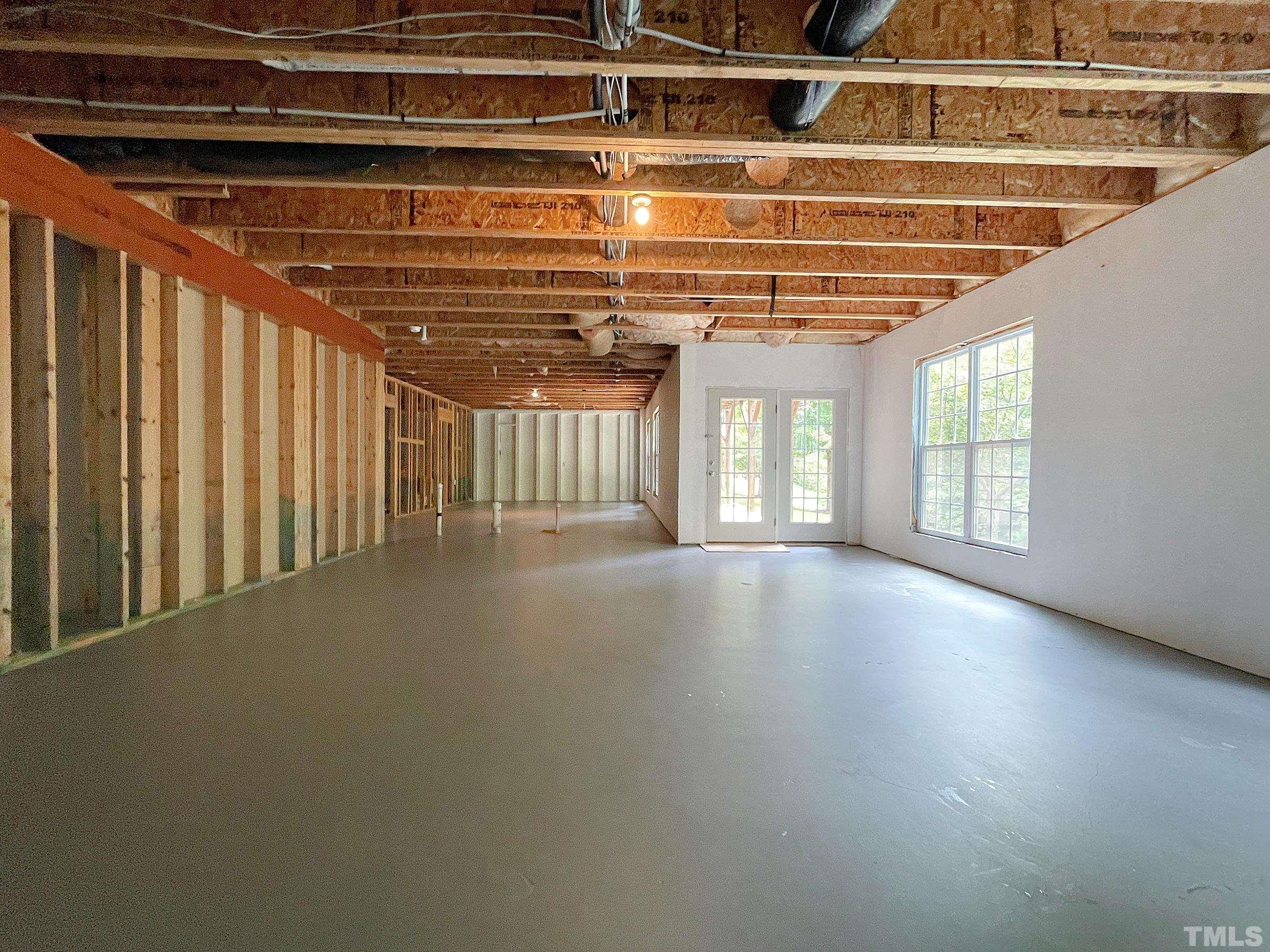 207 Beckingham Loop Cary, NC 27519 - Photo 26 of 40 a view of an empty room with a window