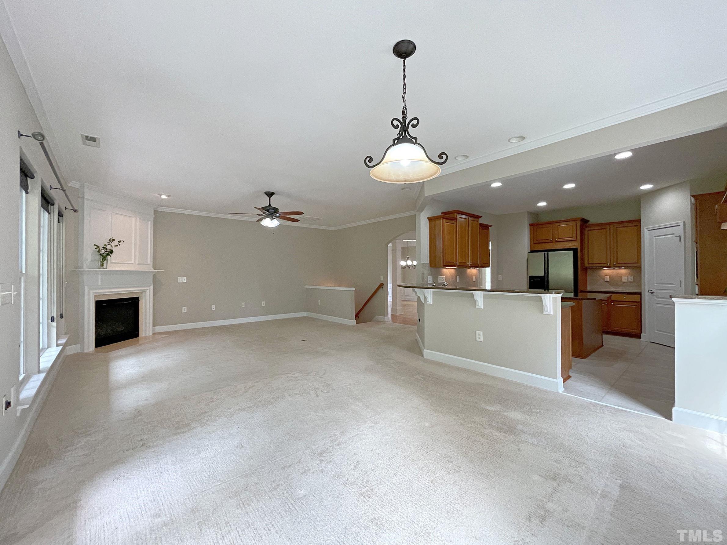 207 Beckingham Loop Cary, NC 27519 - Photo 10 of 40 a view of a kitchen with a sink and microwave