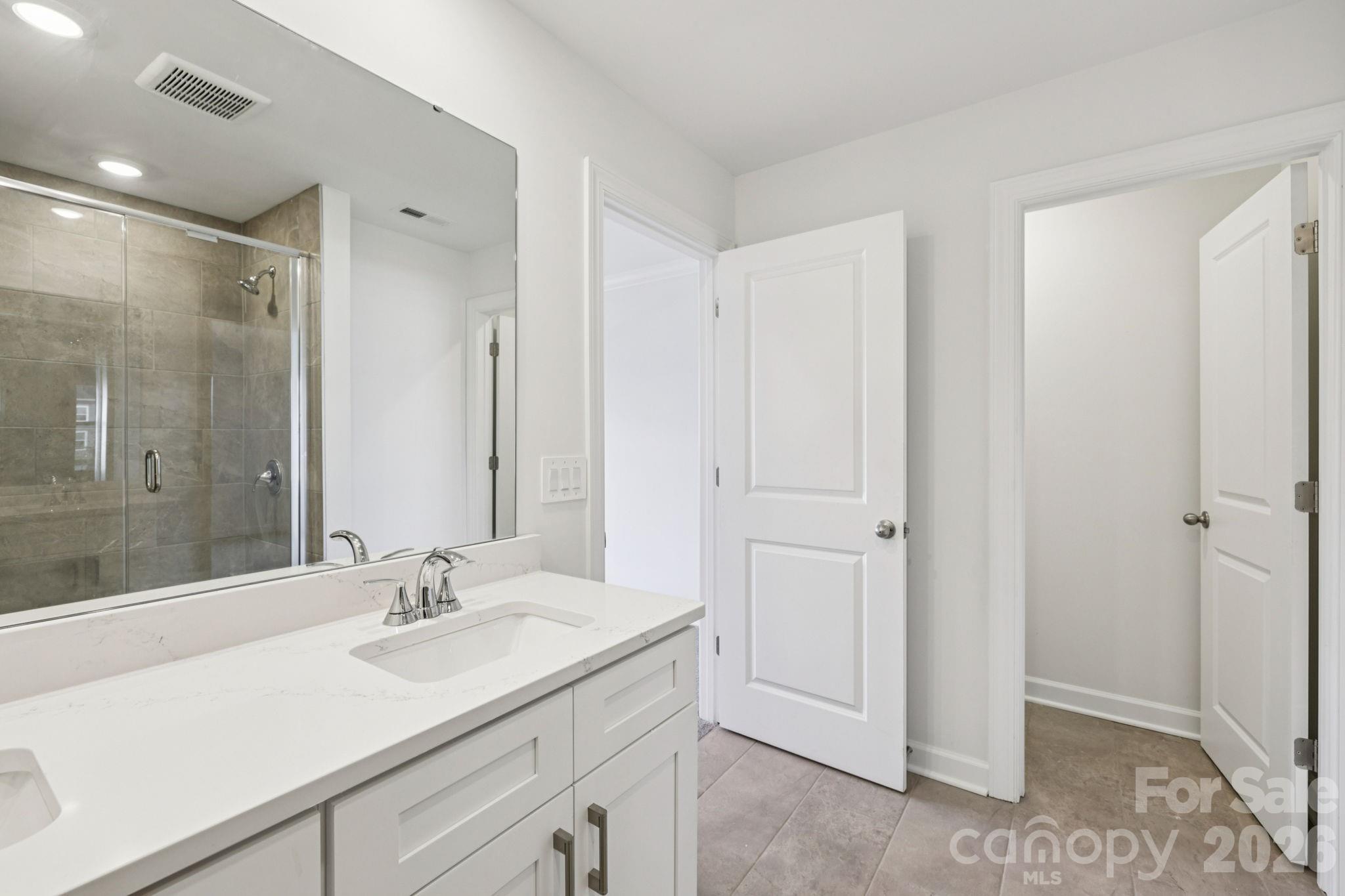 347 Golden Maple Court Fort Mill, SC 29708 - Photo 13 of 21 a bathroom with a sink double vanity and a mirror
