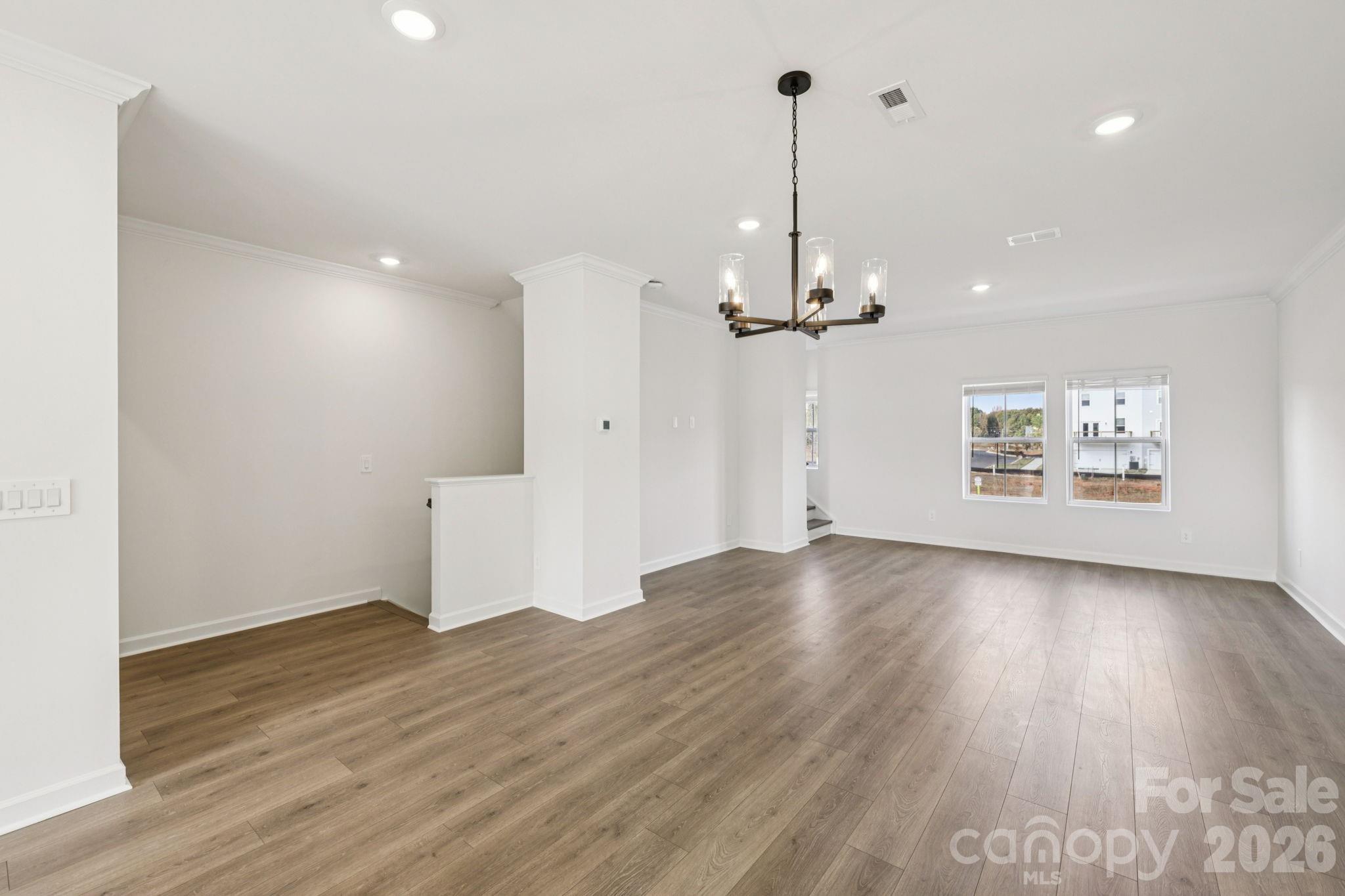 347 Golden Maple Court Fort Mill, SC 29708 - Photo 6 of 21 wooden floor in an empty room with a window