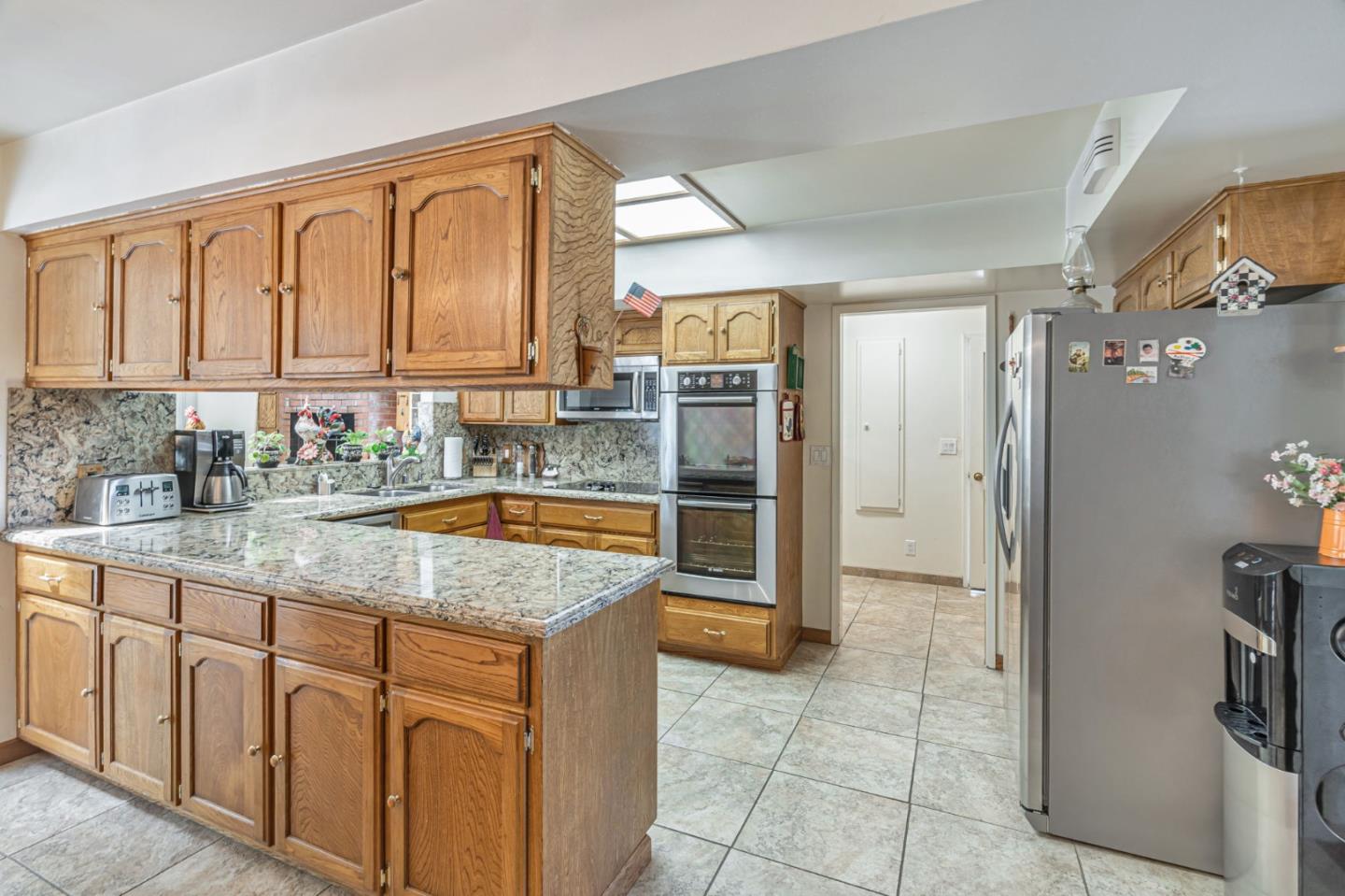 2696 Birchtree Lane Santa Clara, CA 95051 - Photo 12 of 56 a kitchen with stainless steel appliances granite countertop a refrigerator and a sink