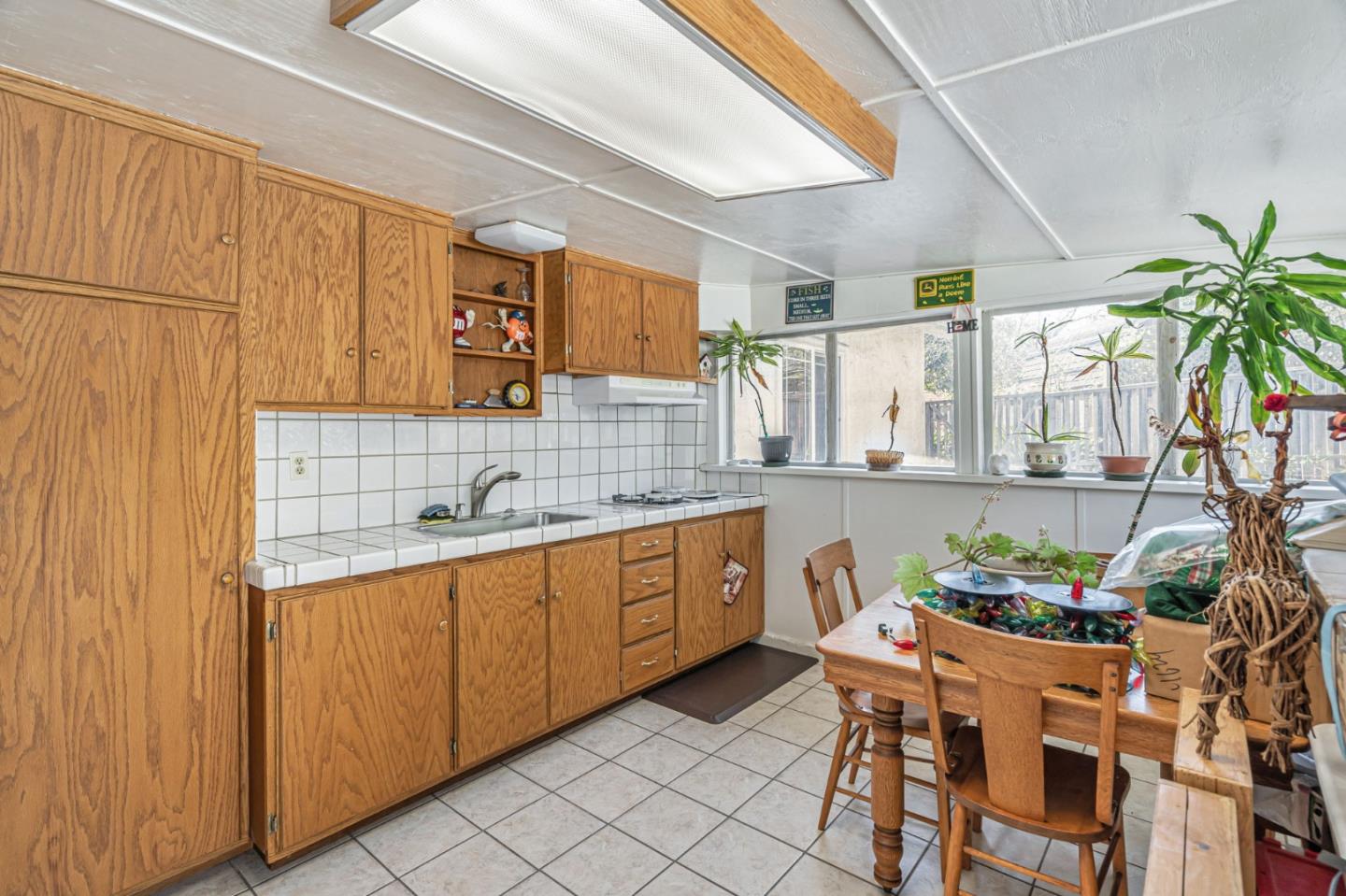2696 Birchtree Lane Santa Clara, CA 95051 - Photo 16 of 56 a kitchen with a sink and cabinets