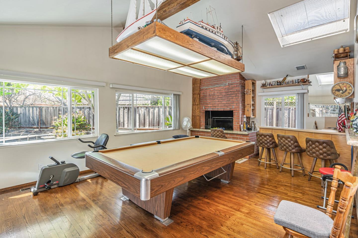 2696 Birchtree Lane Santa Clara, CA 95051 - Photo 20 of 56 a living room with furniture pool table and a fireplace