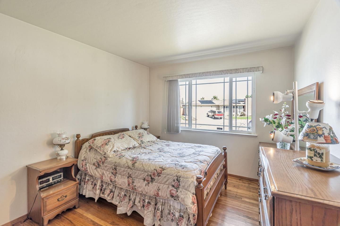 2696 Birchtree Lane Santa Clara, CA 95051 - Photo 24 of 56 a bedroom with a bed and a window