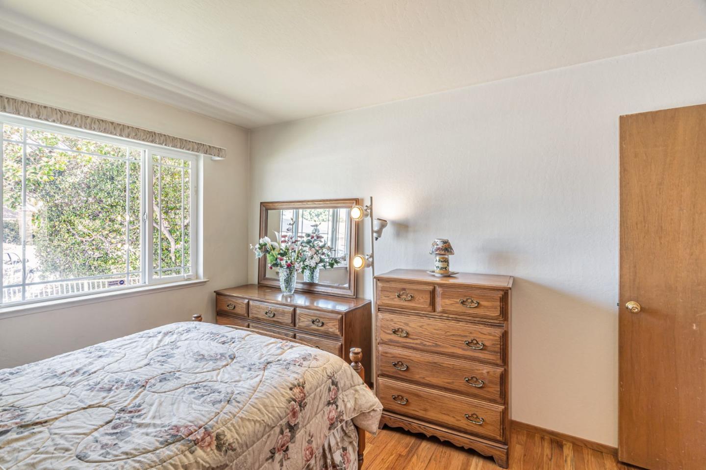 2696 Birchtree Lane Santa Clara, CA 95051 - Photo 25 of 56 a bedroom with a bed and a window