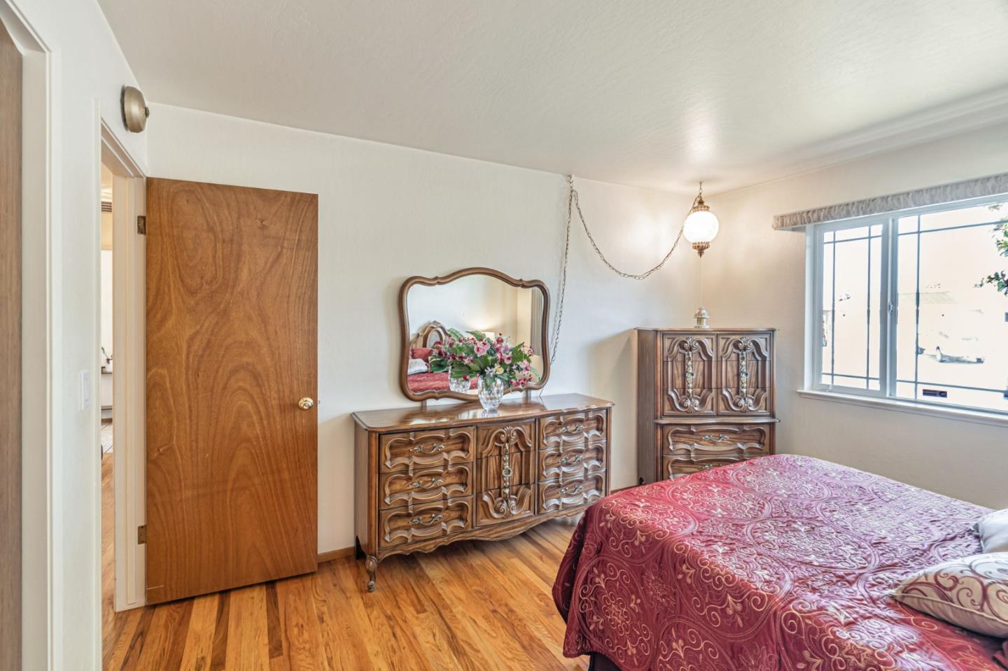 2696 Birchtree Lane Santa Clara, CA 95051 - Photo 27 of 56 a bedroom with a bed dresser and a window
