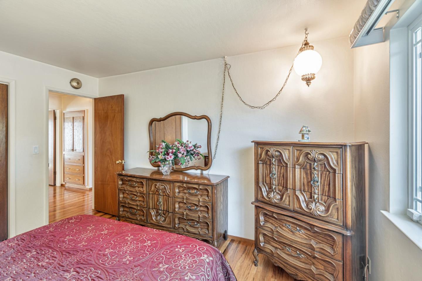 2696 Birchtree Lane Santa Clara, CA 95051 - Photo 28 of 56 a bedroom with a bed a dresser and potted plants on the dresser