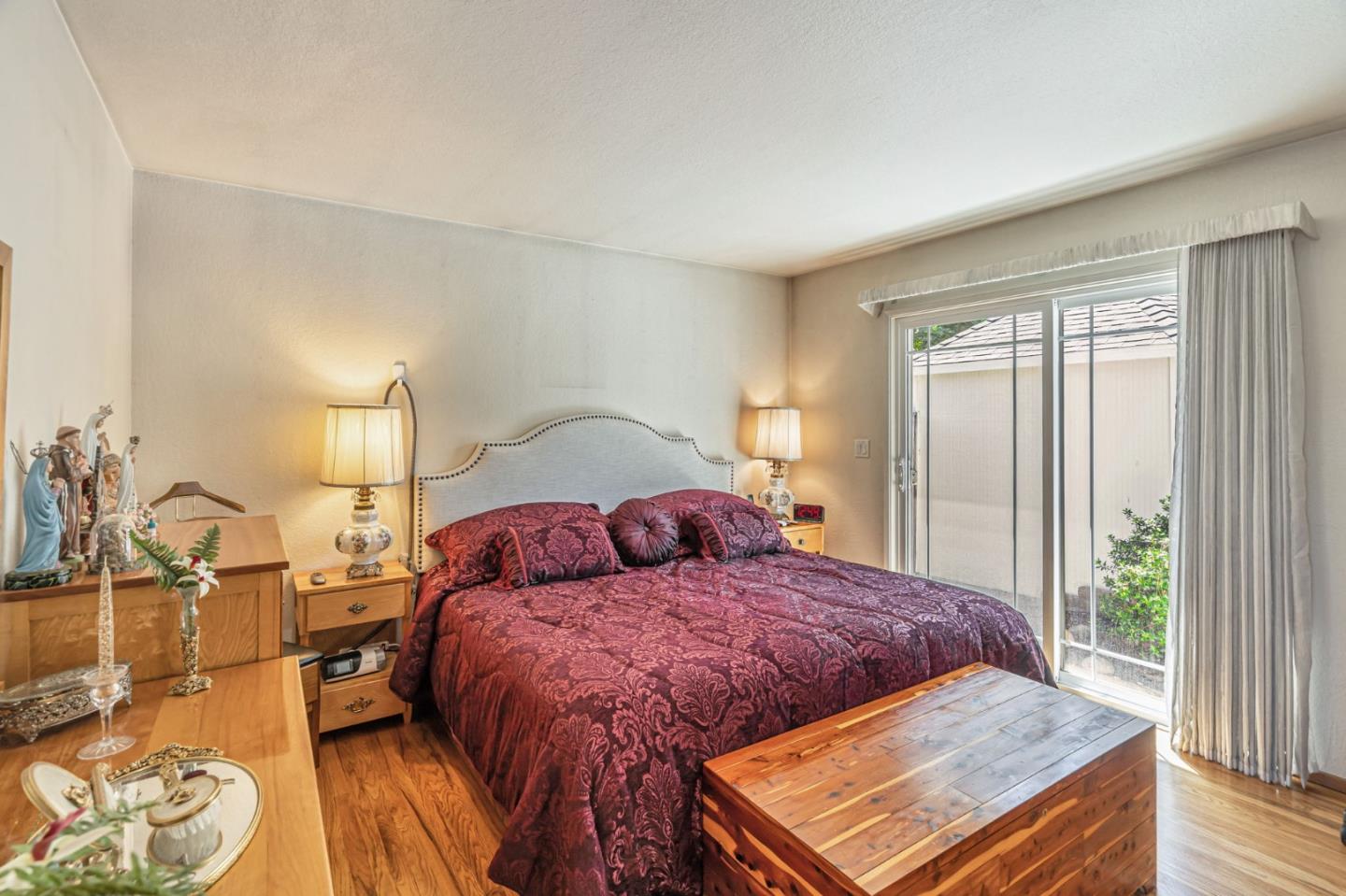 2696 Birchtree Lane Santa Clara, CA 95051 - Photo 29 of 56 a bedroom with a bed and wooden floor