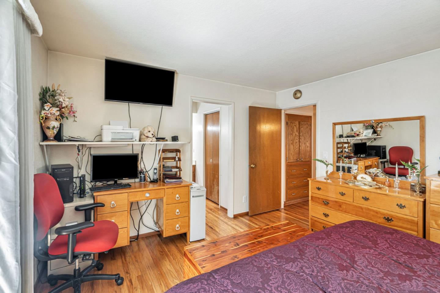 2696 Birchtree Lane Santa Clara, CA 95051 - Photo 31 of 56 a view of a livingroom with workspace and a flat screen tv