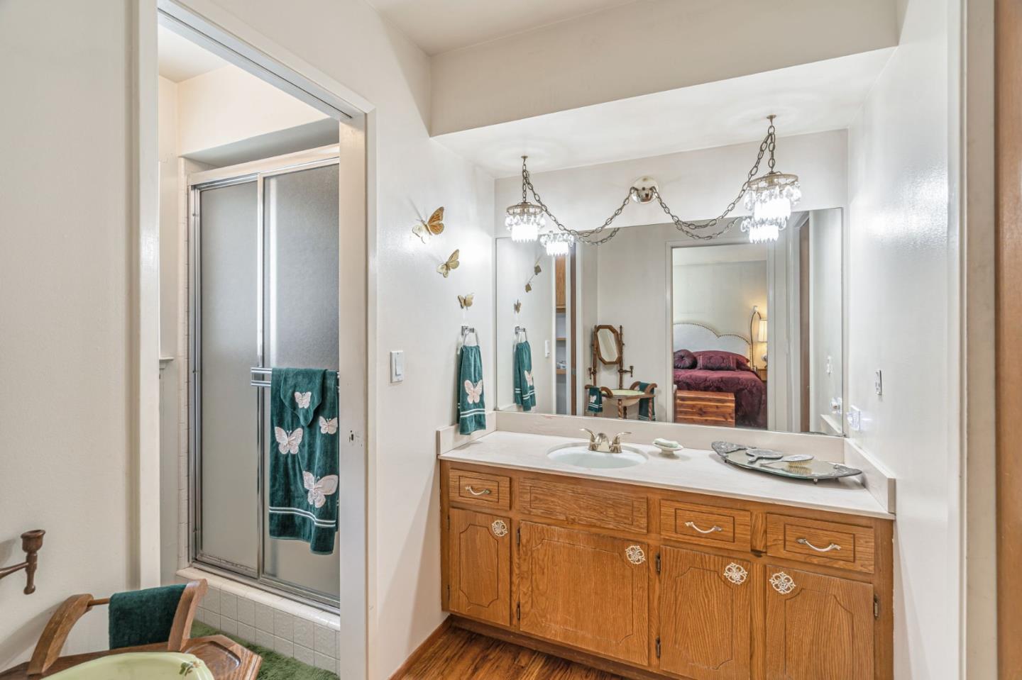 2696 Birchtree Lane Santa Clara, CA 95051 - Photo 32 of 56 a bathroom with a double vanity sink and a mirror