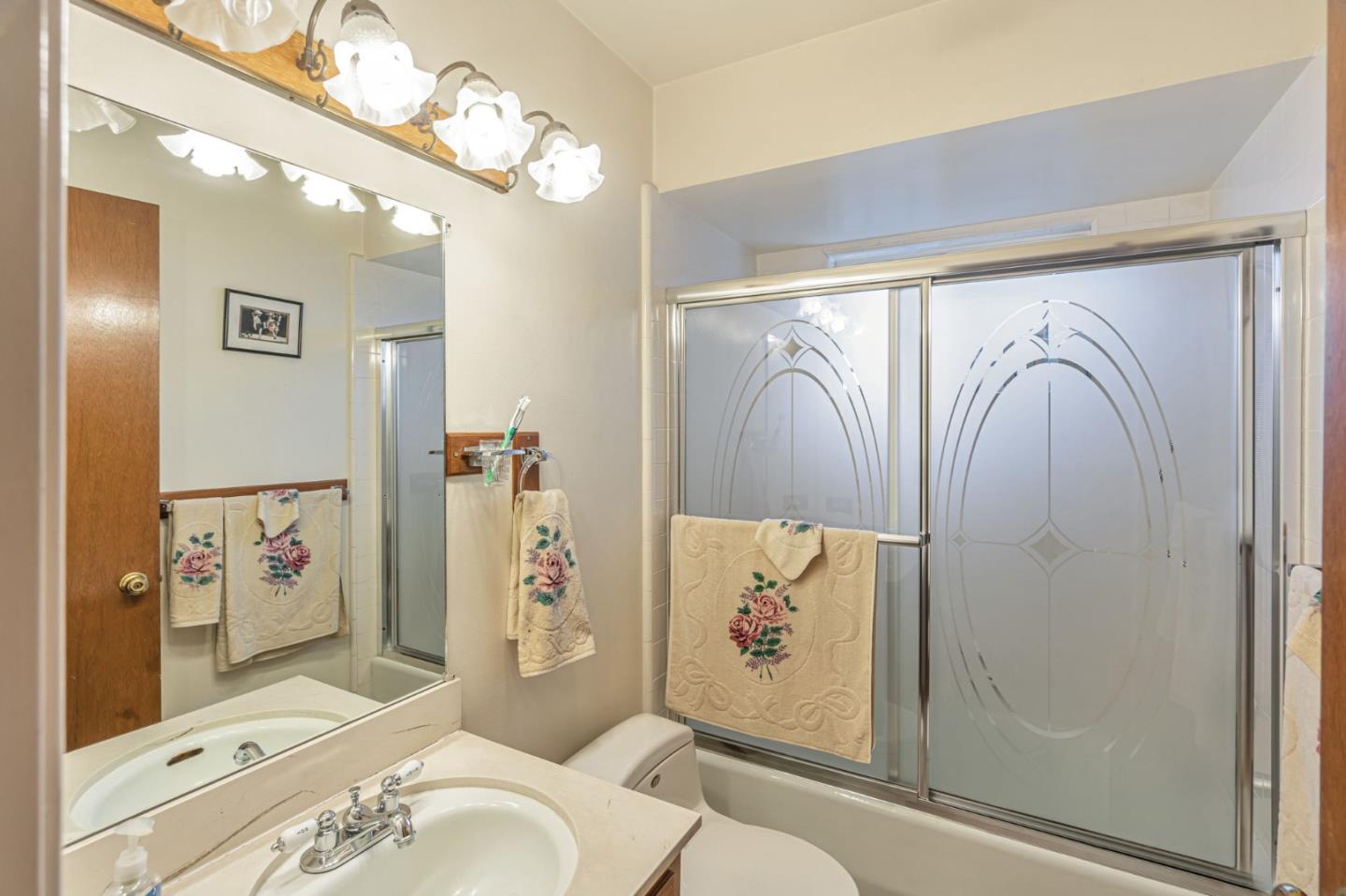 2696 Birchtree Lane Santa Clara, CA 95051 - Photo 34 of 56 a bathroom with a sink a toilet and shower