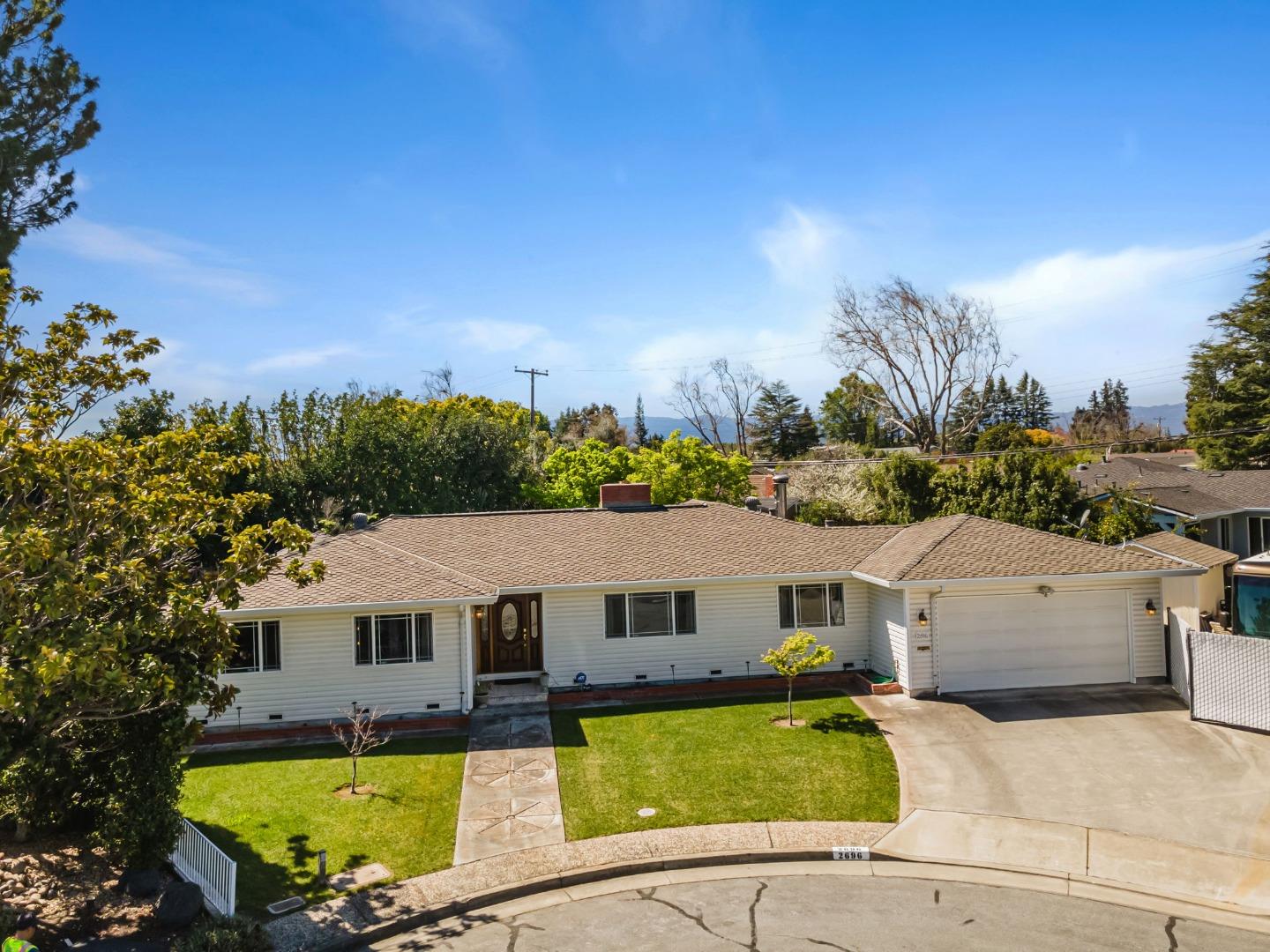 2696 Birchtree Lane Santa Clara, CA 95051 - Photo 47 of 56 a view of a house with pool and a chairs