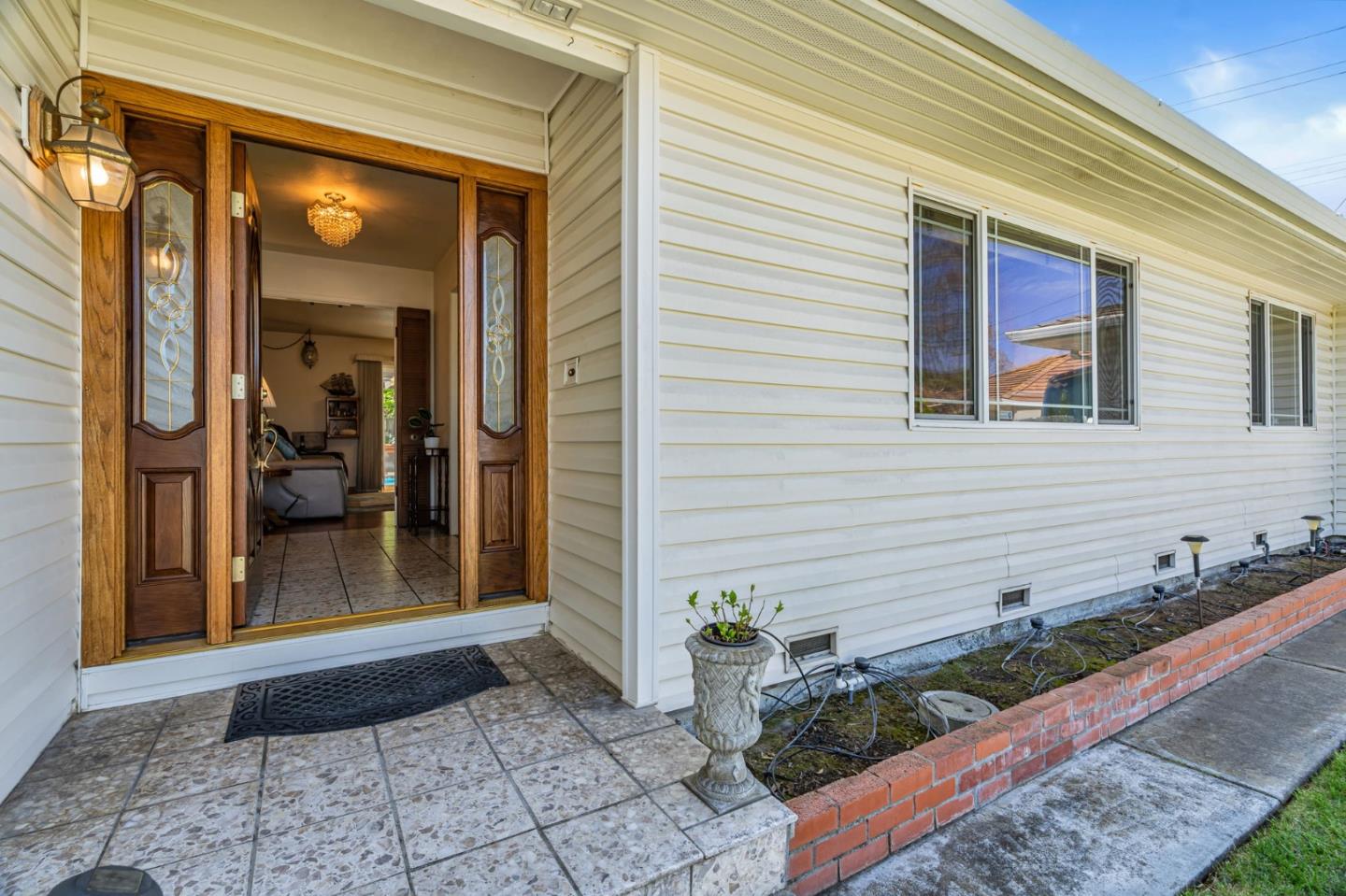2696 Birchtree Lane Santa Clara, CA 95051 - Photo 5 of 56 a view of a entryway door front of house
