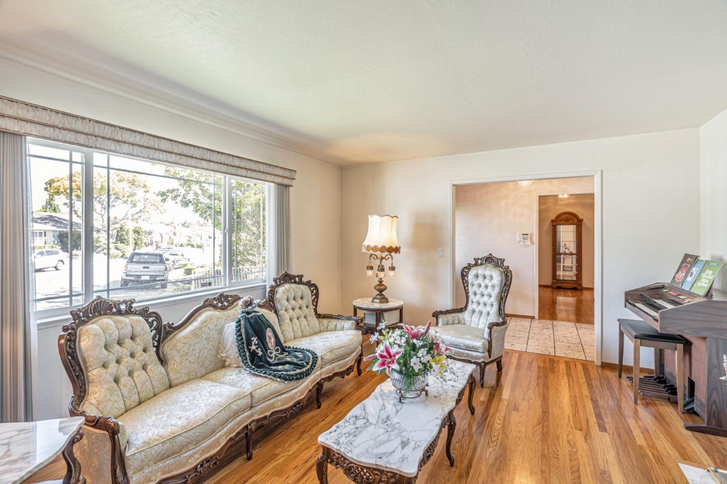 2696 Birchtree Lane Santa Clara, CA 95051 - Photo 7 of 56 a living room with furniture and a large window