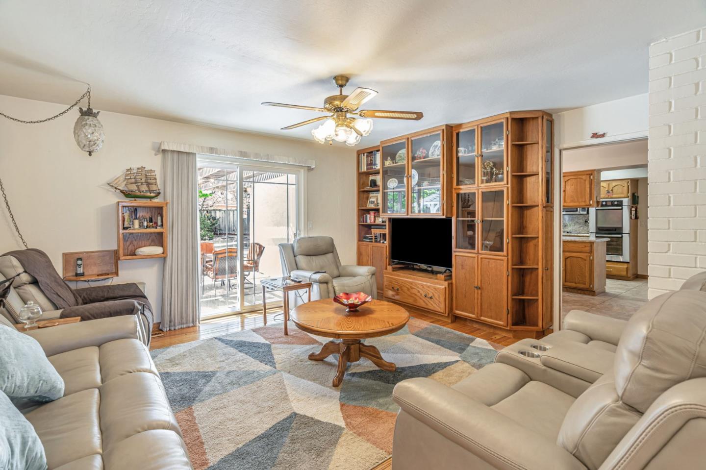 2696 Birchtree Lane Santa Clara, CA 95051 - Photo 10 of 56 a living room with furniture and a flat screen tv