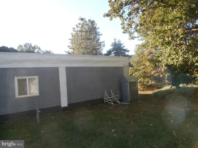 a view of backyard and entertaining space