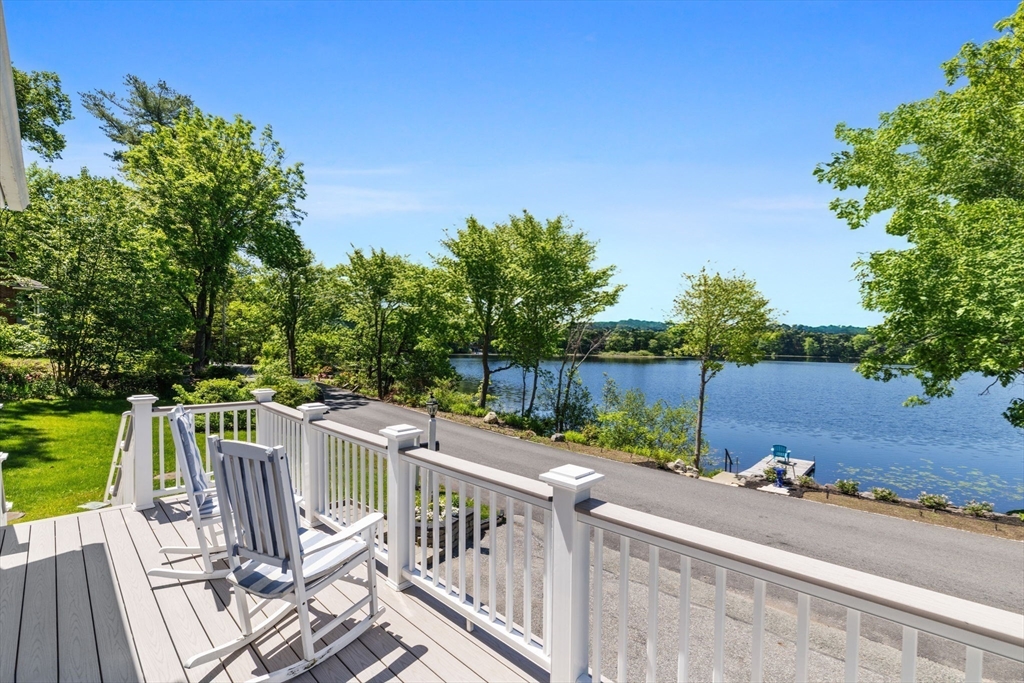 35 Keyes Road Westford, MA 01886 - Photo 30 of 40 a view of a deck with couches and wooden fence