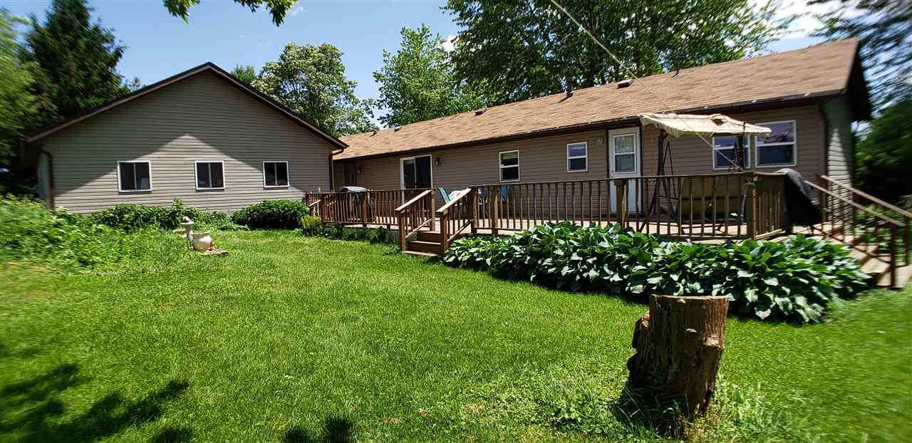 1573 Burkett Road Dixon, IL 61021 - Photo 1 of 25 a front view of a house with garden