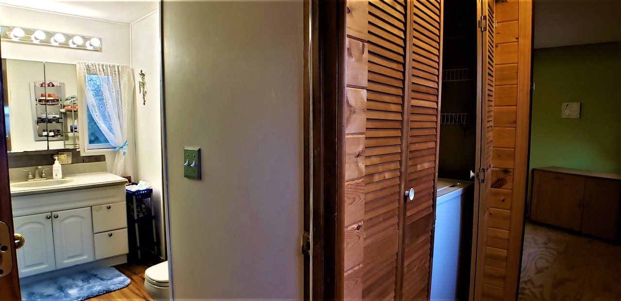 1573 Burkett Road Dixon, IL 61021 - Photo 15 of 25 a bathroom with a sink and a mirror