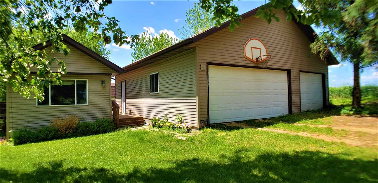 1573 Burkett Road Dixon, IL 61021 - Photo 24 of 25 a view of a house with a yard