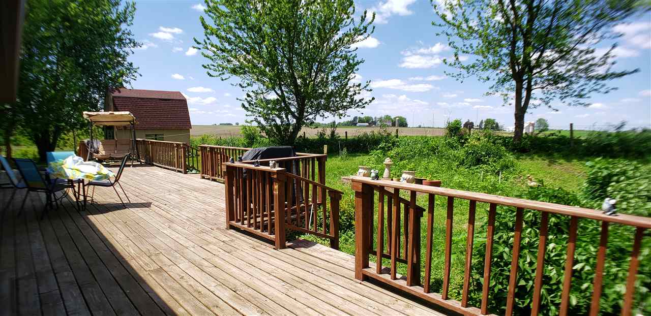 1573 Burkett Road Dixon, IL 61021 - Photo 4 of 25 a view of balcony and deck with wooden floor and fence