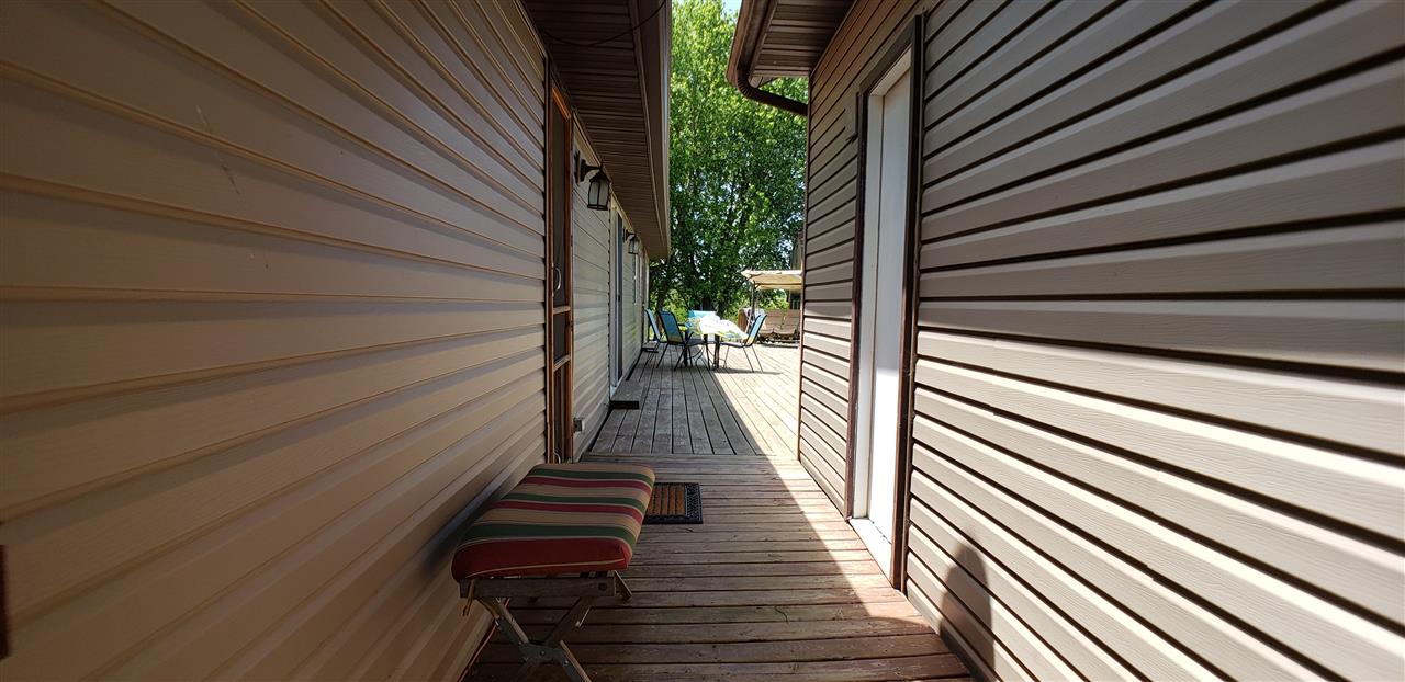 1573 Burkett Road Dixon, IL 61021 - Photo 5 of 25 a view of balcony with wooden floor