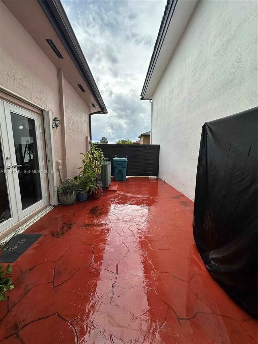 15318 Southwest 41st Terrace Miami, FL 33185 - Photo 28 of 30 a view of backyard with patio