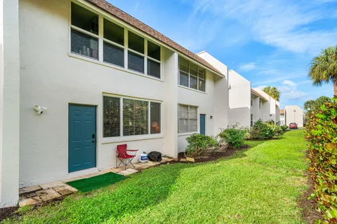 a house view with a garden space