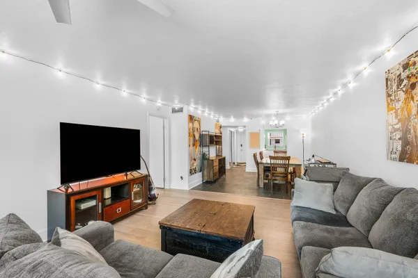 a kitchen with a sink stove and refrigerator