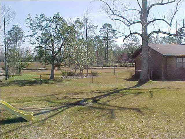 2249 Stallion Road Cantonment, FL 32533 - Photo 18 of 20 looking eastward from the back yard to the front yard