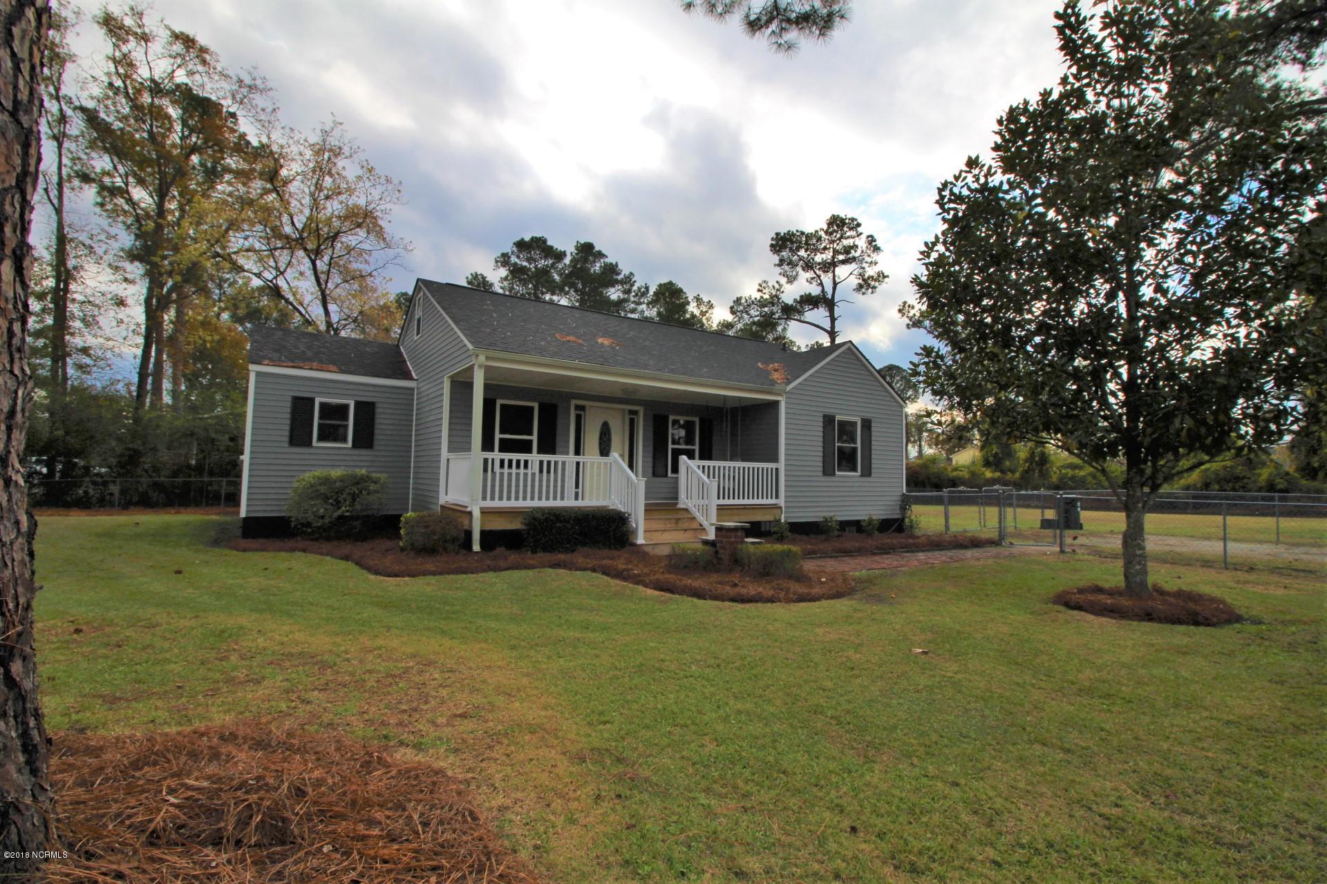 200 Riverside Drive New Bern, NC 28560 - Photo 11 of 64 Young magnolia tree in front yard
